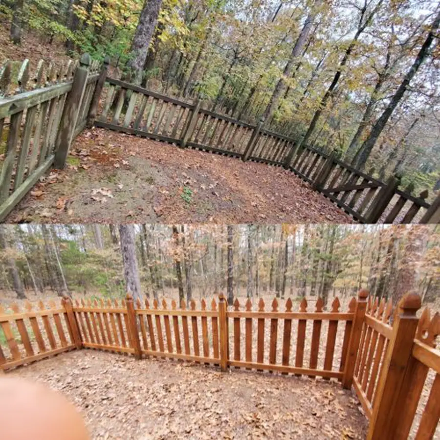 Cleaned fence and outbuilding on a wooded acreage property near Guy